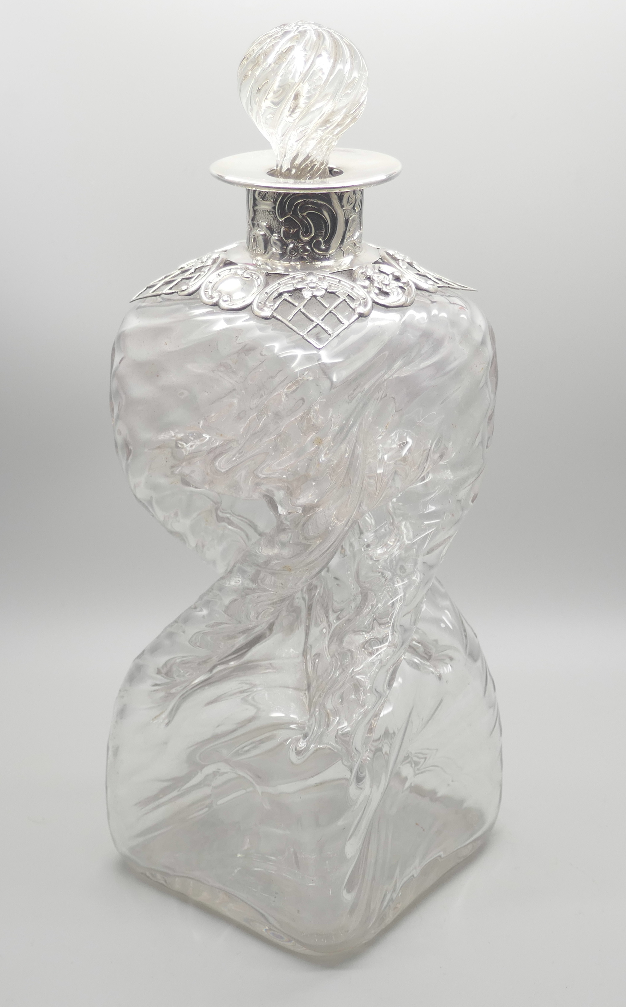 A Victorian silver topped twisted glass decanter, London 1892