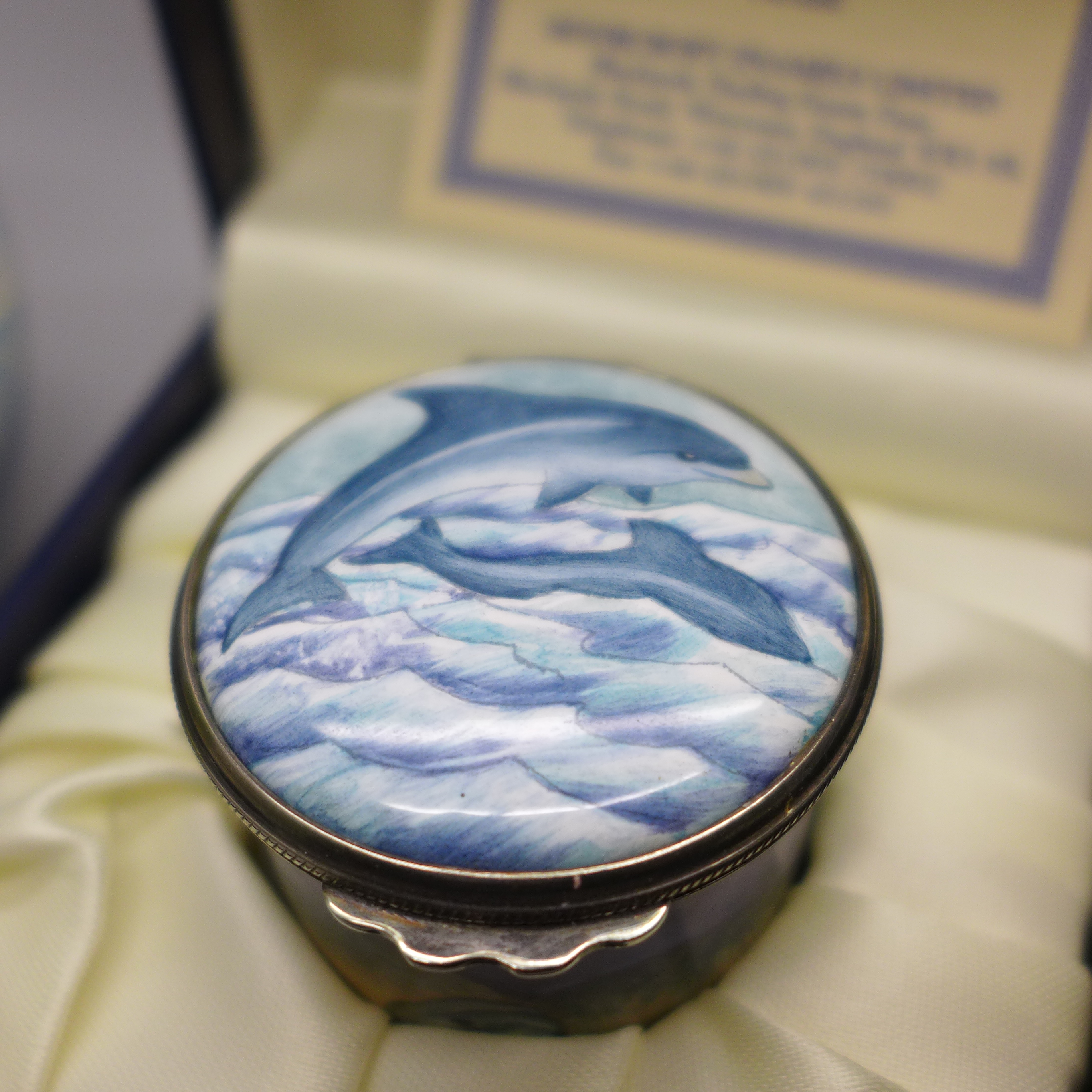 Four Moorcroft enamels, Dolphin & Manatee pill box, 31/75, boxed, Hummingbird, boxed, vase decorated - Image 4 of 6