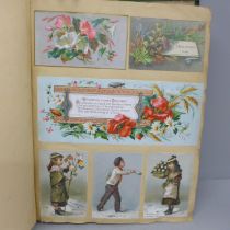 An album of Victorian greeting cards, 240 in total, Christmas, New Year and Birthday, interspersed