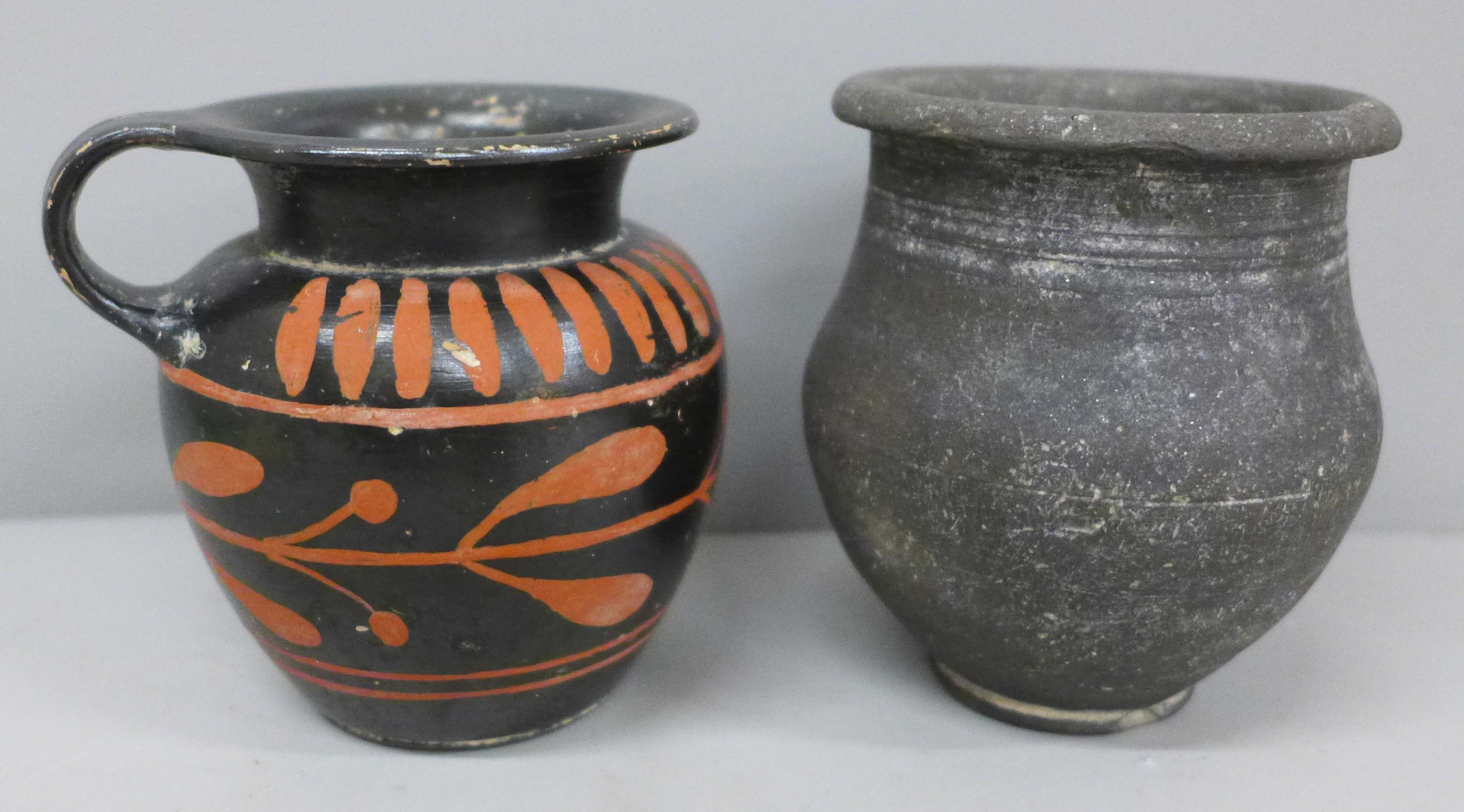 A hand painted Greek vase with certificate of authenticity, circa 4th Century, 8cm and a later Roman