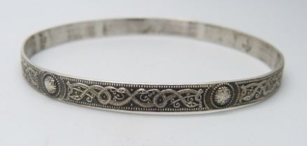 A 925 silver Celtic design bangle, stamped 'T'