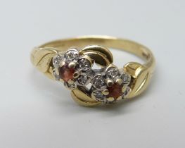 A ruby and diamond double cluster ring, hallmark worn, 2.6g, O
