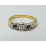 An 18ct gold diamond and sapphire ring, 3.7g, M