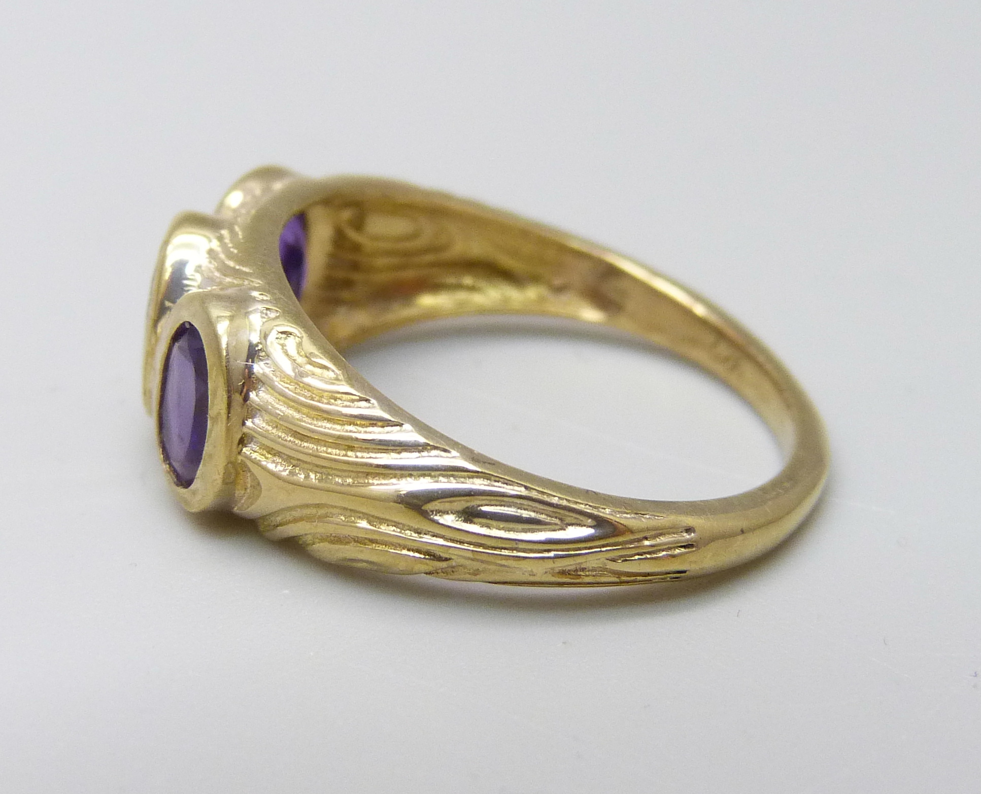 A silver gilt and amethyst trilogy ring, P - Image 2 of 3