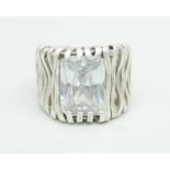 A silver ring set with a faceted gem stone, marked Sampson 925, 12g, P