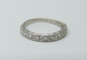 An 18ct white gold and diamond half-eternity ring, 2.2g, K