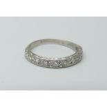 An 18ct white gold and diamond half-eternity ring, 2.2g, K