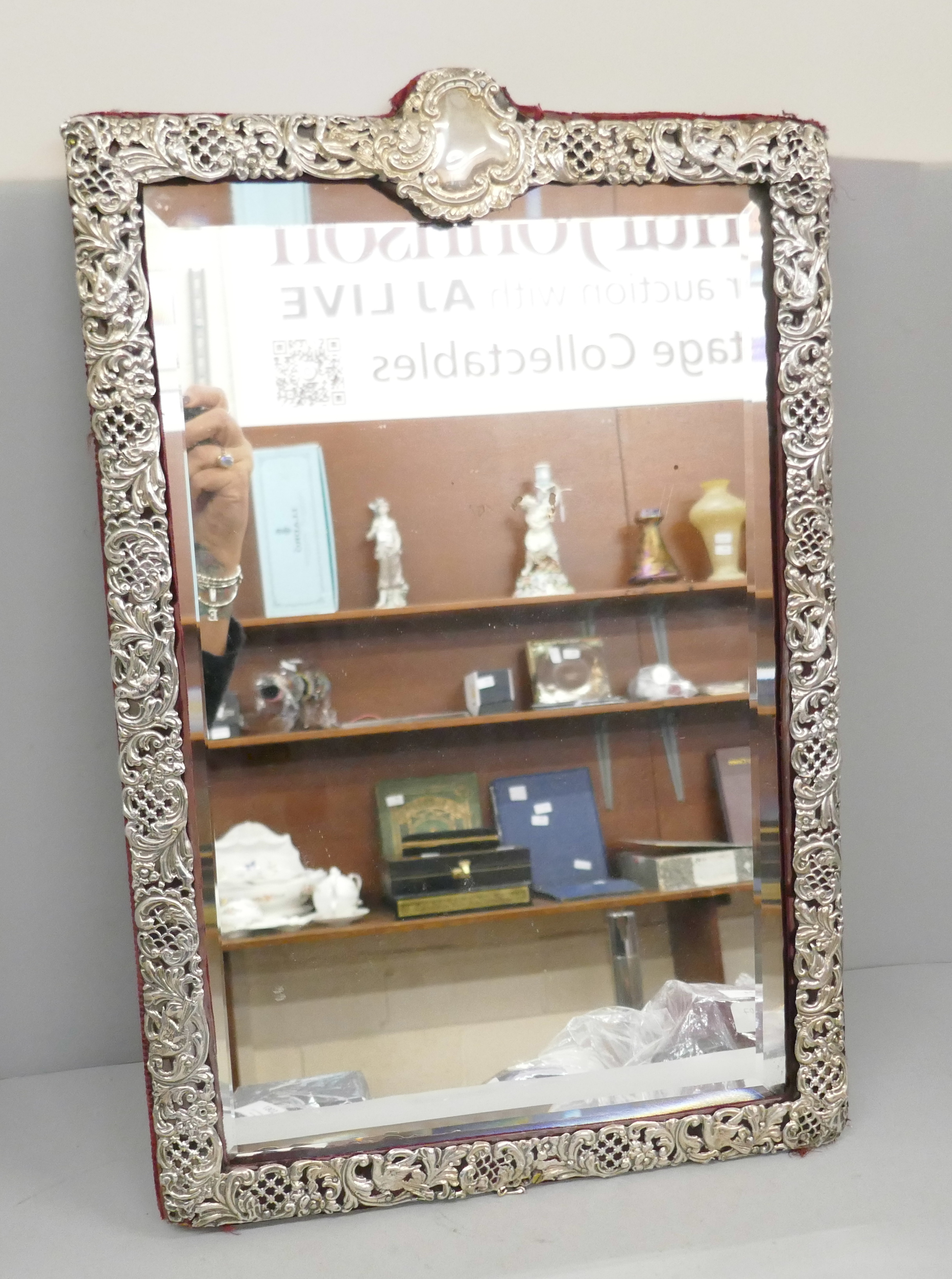 A large Victorian silver framed mirror, 33cm wide