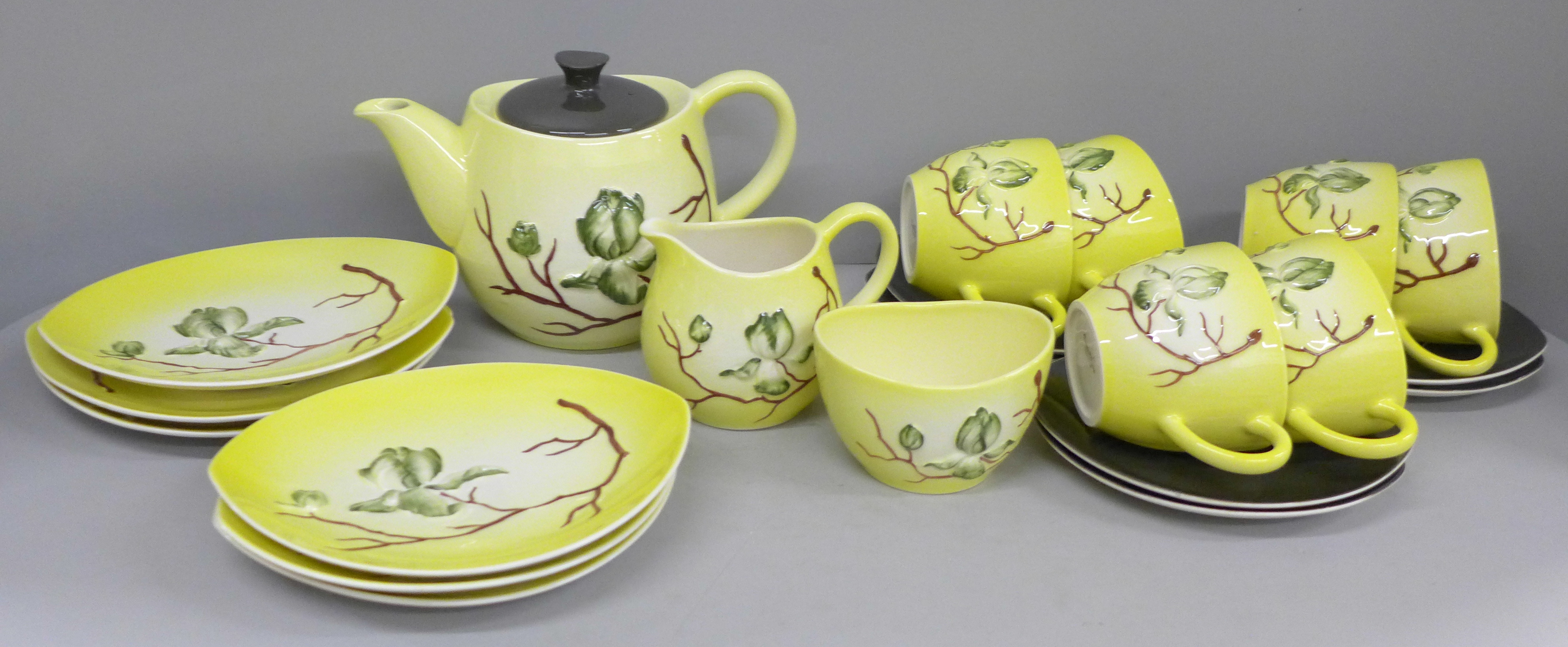 A Carlton Ware Magnolia pattern six setting tea set