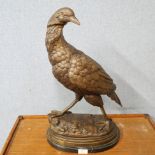 A large bronze figure of a grouse