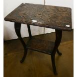 An Arts and Crafts Liberty & Co. carved wood Japanese occasional table
