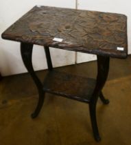 An Arts and Crafts Liberty & Co. carved wood Japanese occasional table