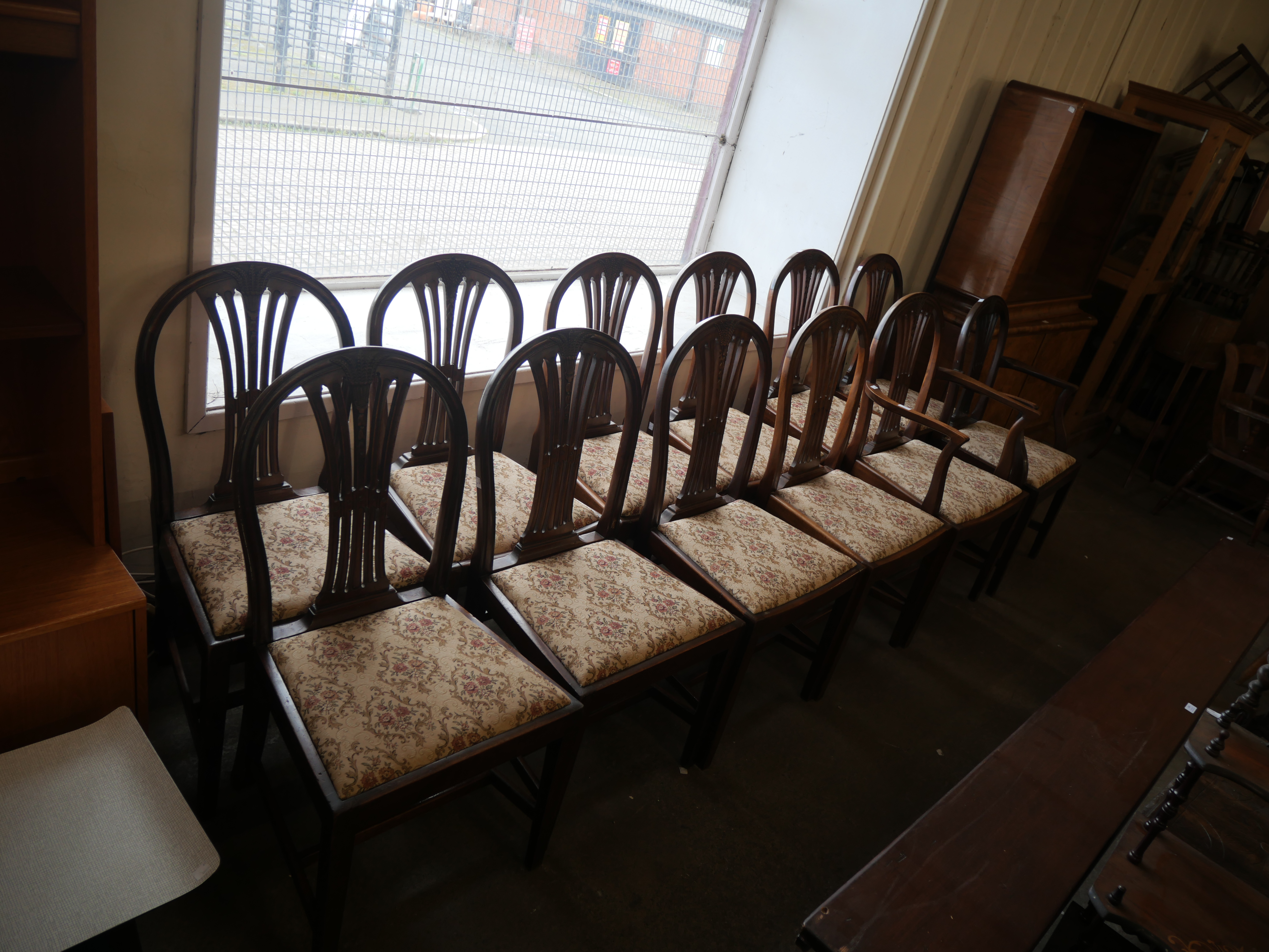 A Harlequin set of twelve Hepplewhite style mahogany dining chairs - Image 2 of 4