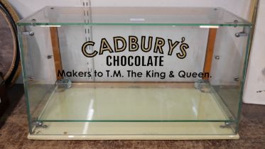 A shop display cabinet, bearing Cadbury's inscription