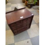 A six drawer table top chest