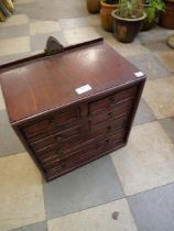 A six drawer table top chest