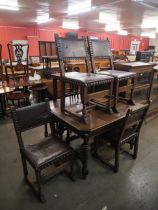 A 19th Century French carved oak centre table and four chairs