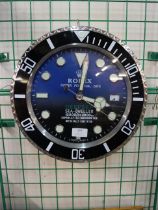 A Rolex deep sea display clock