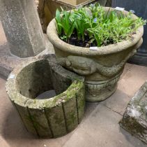 Two concrete garden planters