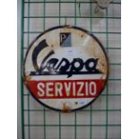 An enamelled metal Vespa advertising sign