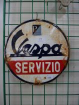 An enamelled metal Vespa advertising sign