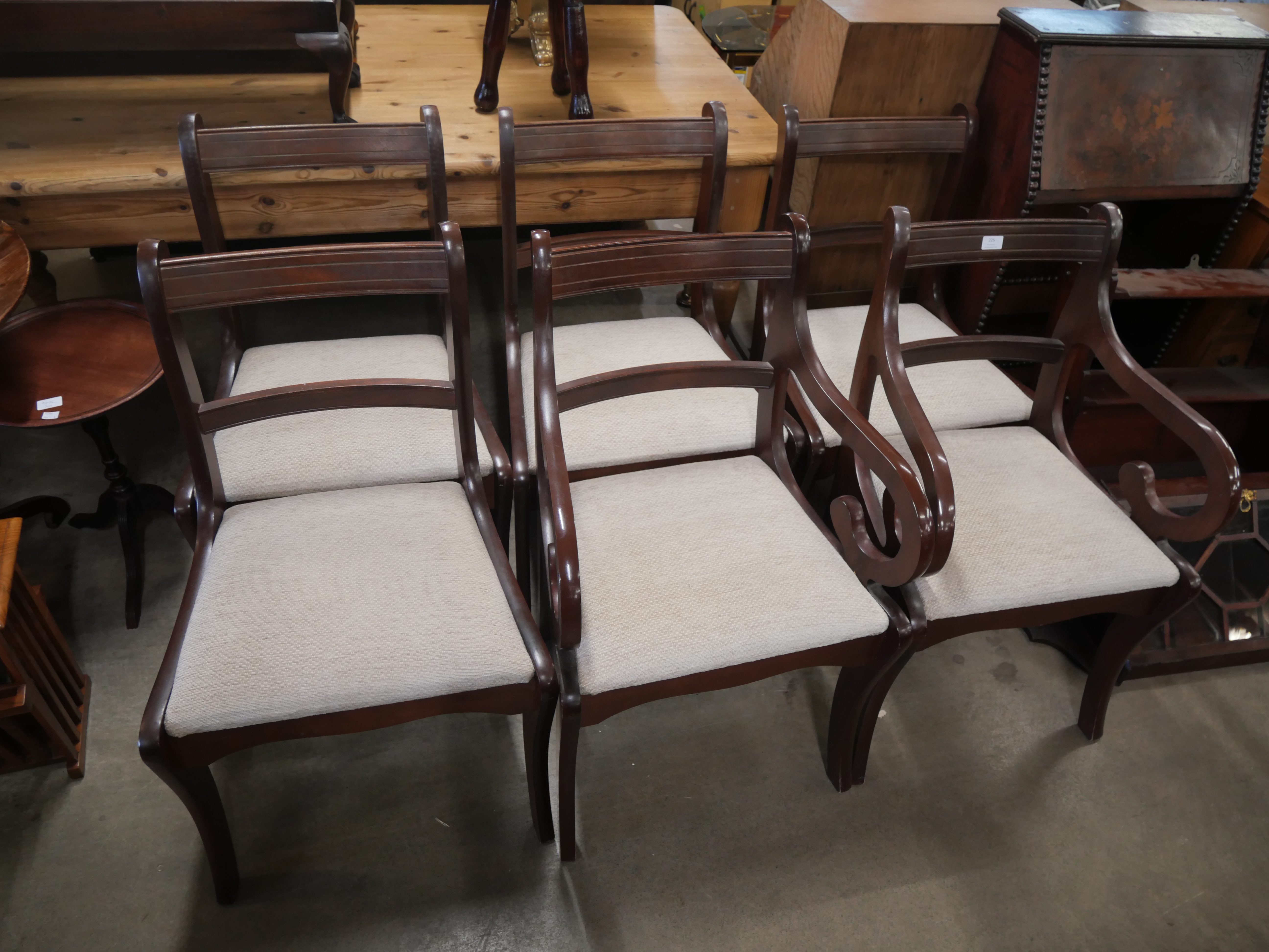 A set of six Regency style mahogany dining chairs
