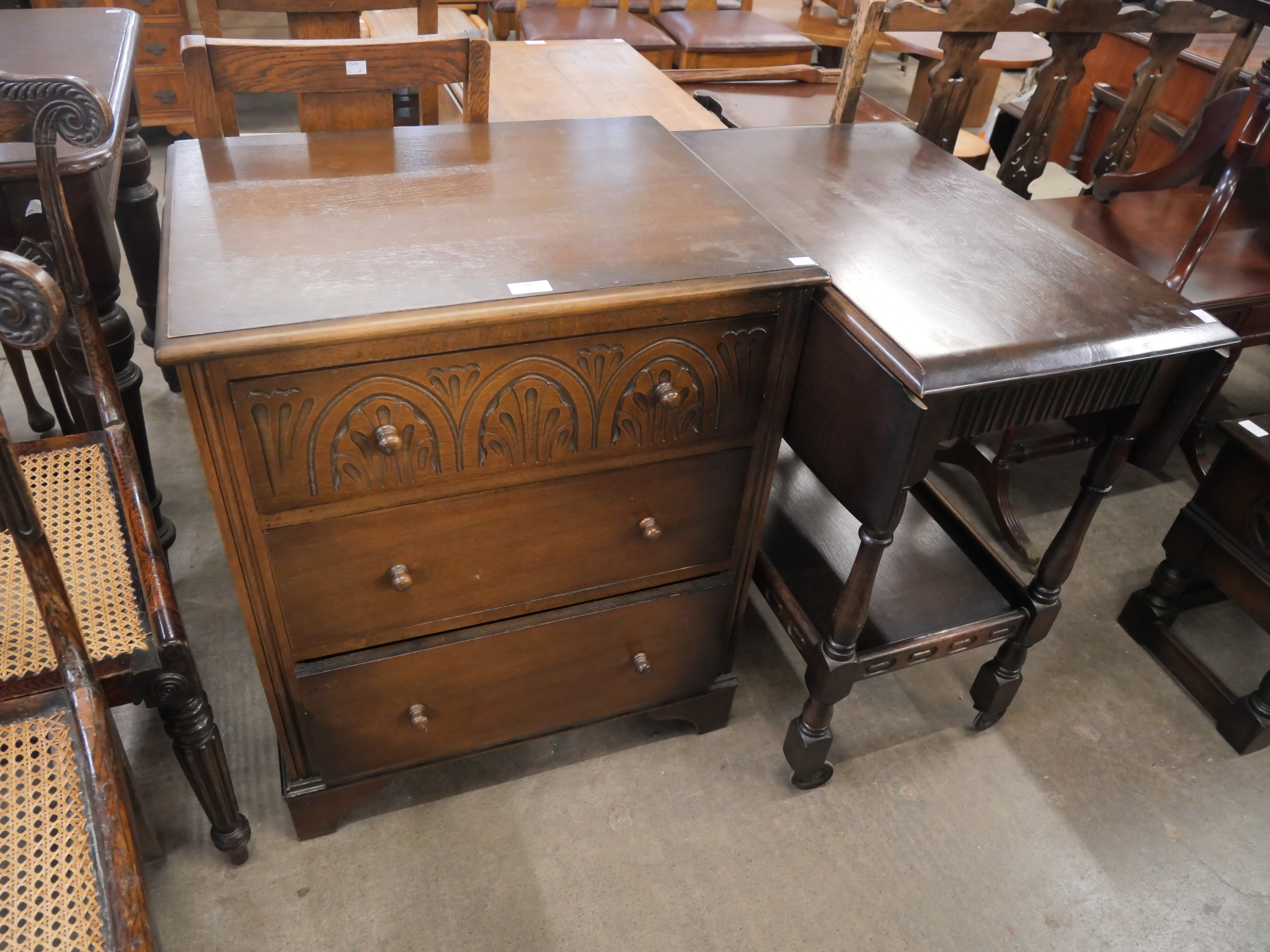 An oak trolley and chest of drawers