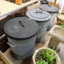 Three galvanised dust bins