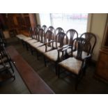 A Harlequin set of twelve Hepplewhite style mahogany dining chairs