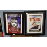 A Titanic framed sign and a Les Miserables print