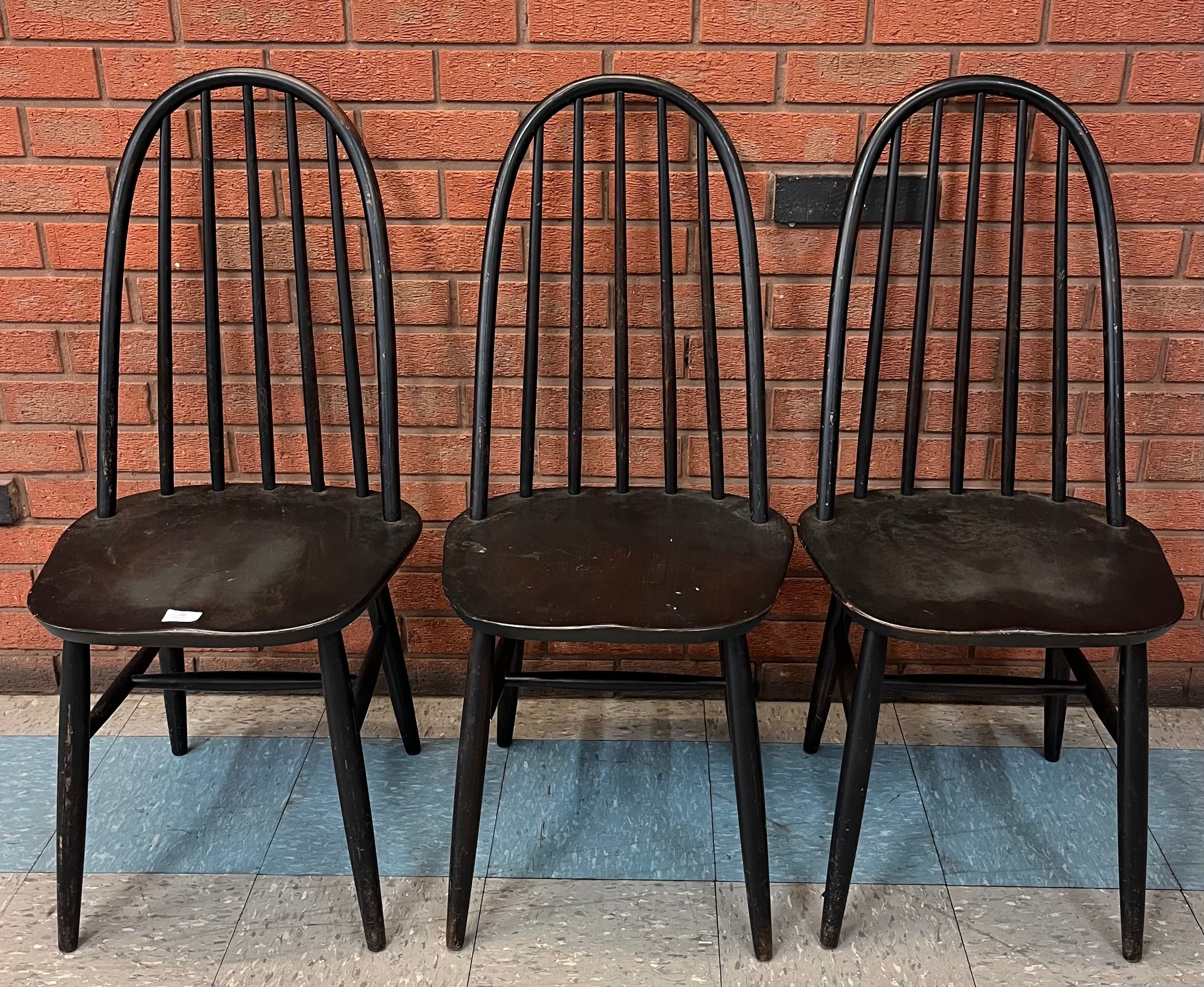 A set of three black painted Scandinavian kitchen chairs