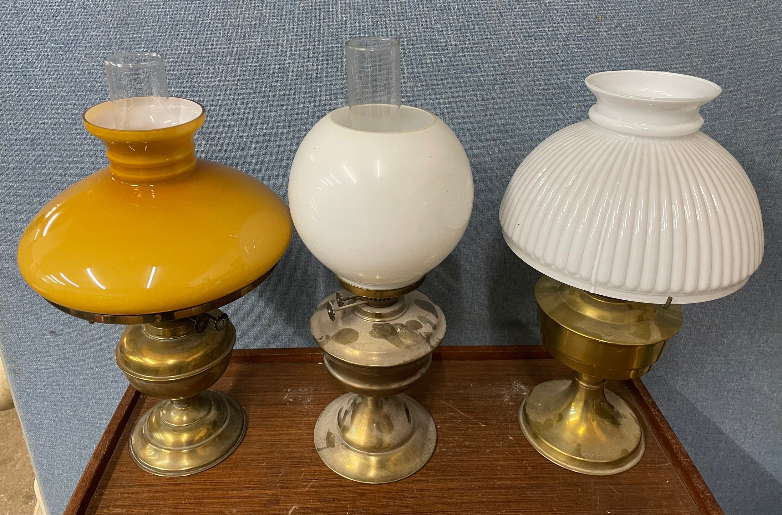 Three oil lamps
