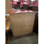 A pine pantry cupboard