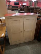 A pine pantry cupboard