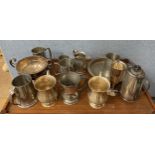 A collection of tankards and plated ware