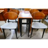 A G-Plan Librenza tola wood and black drop-leaf table and four chairs