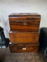 A Victorian walnut writing slope and two Victorian jewellery boxes