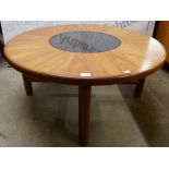 A G-Plan teak and glass topped circular coffee table
