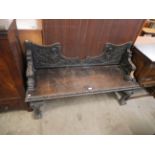 A Victorian carved oak hallseat