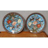 A pair of champleve enamelled plates