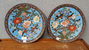 A pair of champleve enamelled plates