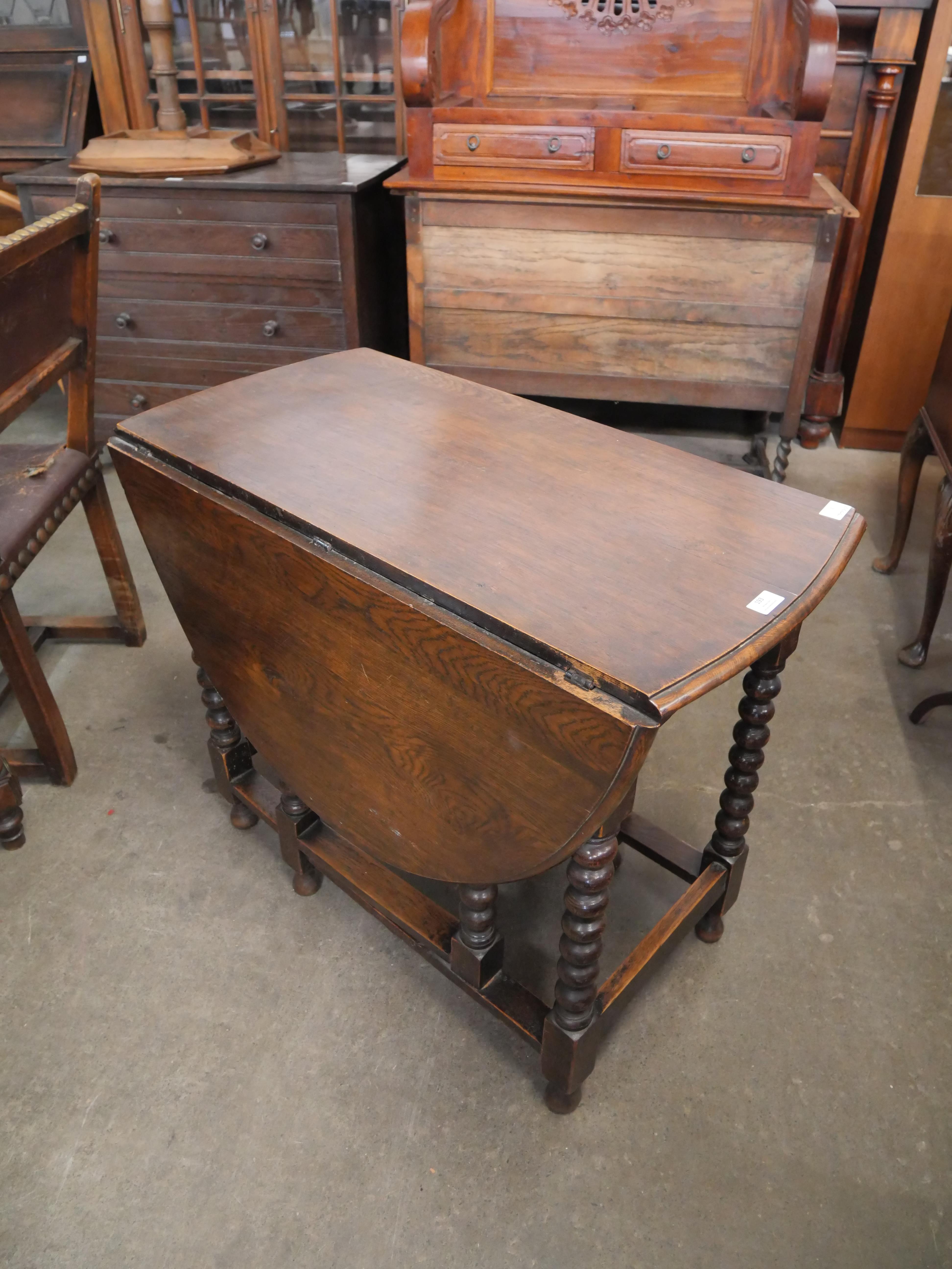 An oak bobbin turned gateleg table