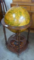 An Italian terrestrial globe cocktail cabinet/trolley