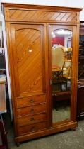 A Victorian Aesthetic Movement pine wardrobe