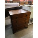 An oak chest of drawers