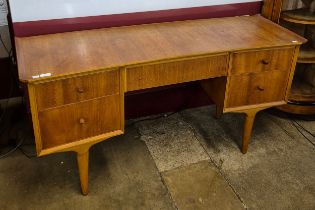 A teak concave desk