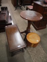 An oak drop leaf occasional table, wine table and nest of tables