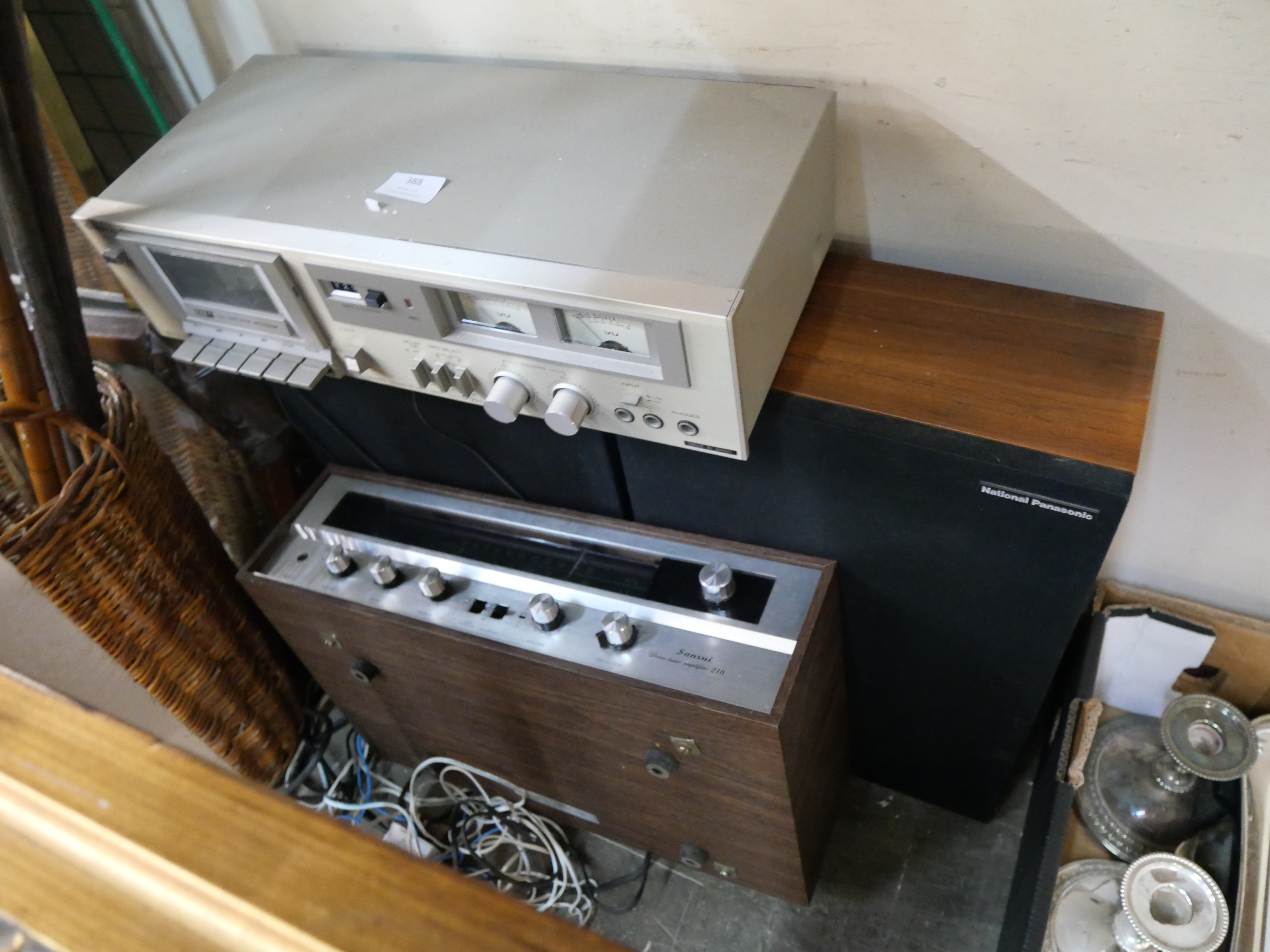 An Hitachi tape deck, a Sansui radio and pair of Panasonic speakers