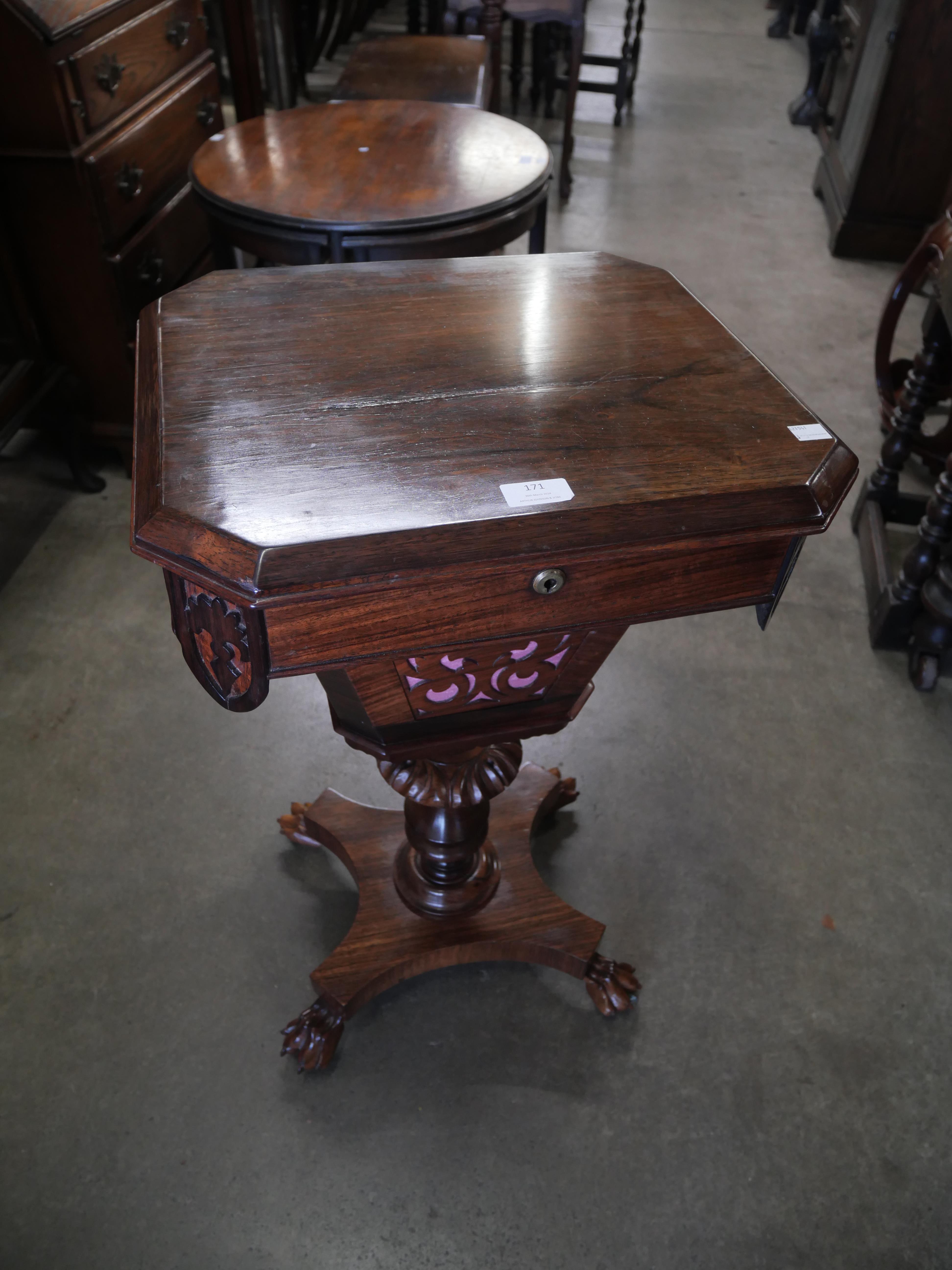 An early Victorian rosewood lady's sewing table