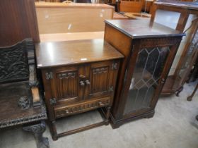 An oak linenfold cabinet